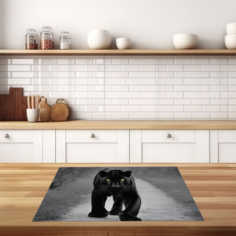 inductiebeschermer zwarte panter gele ogen keuken